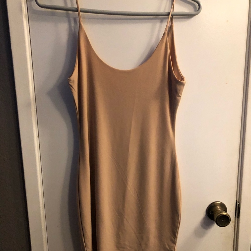 Nude body on Dress from Laura’s Boutique